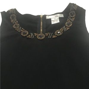 WD.NY sleeveless tunic with jeweled neckline. Tunic in black. Size Medium